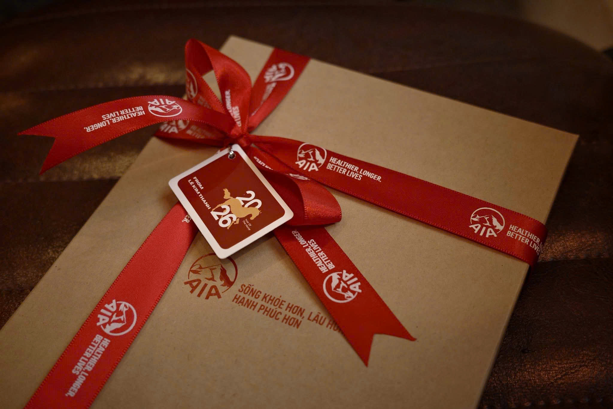 Nâng Tầm Quà Tặng Doanh Nghiệp Lễ Tết Với Nơ Ruy Băng Đỏ In Logo